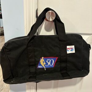 EVERYTHING MUST GO. NBA Black Duffel Bag with 50th Anniversary Logo